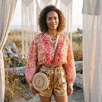 Floral boho button down shirt worn by a model