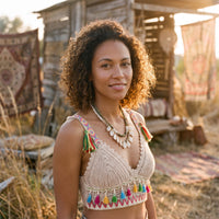 Model wearing the fringe crochet crop top with tassels