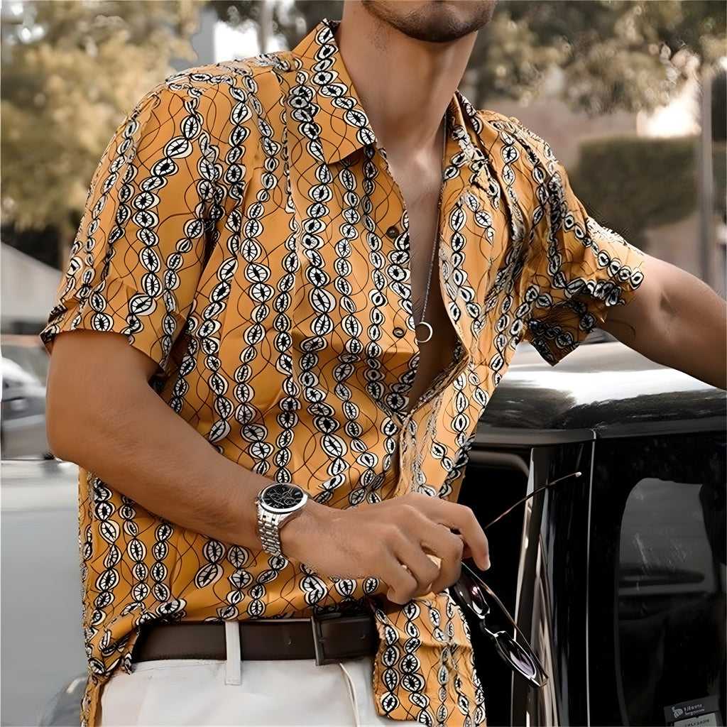 Mustard shirt with cowrie shell print and open camp collar