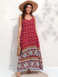 Smiling plus size model wearing red floral boho maxi dress