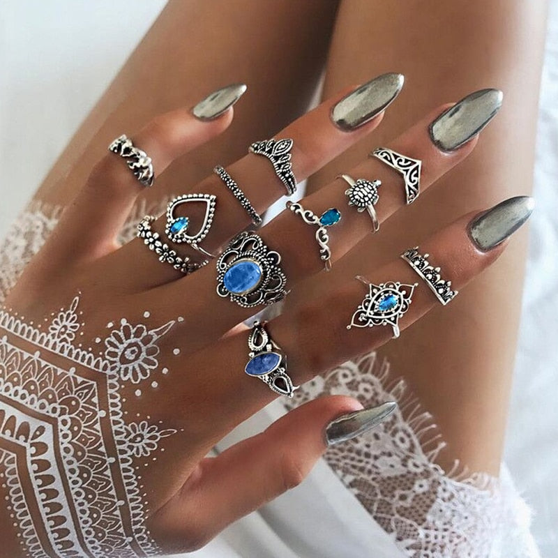 Silver-plated hippie ring set displayed together, boho southwestern style