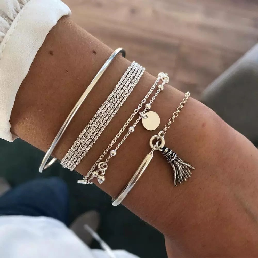 Silver hippie bracelet with beads and small Buddha head charms