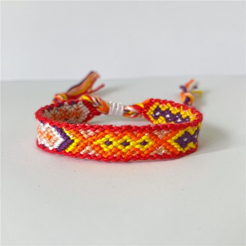 Hippie spirit bracelet in plum and mauve with gold motifs
