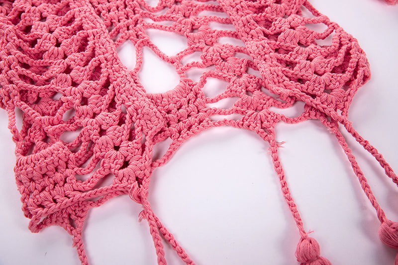 Chaleco hippie de punto rosa visto desde otro ángulo