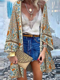 Beige boho top met relaxte snit en artistiek detail
