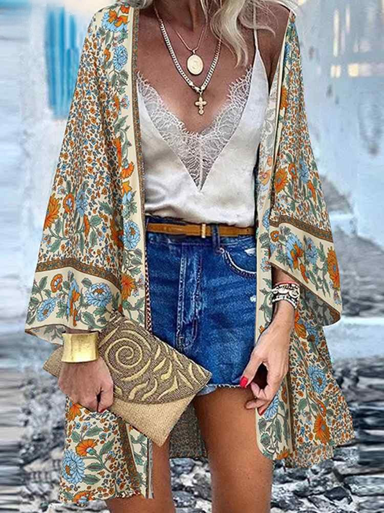 Beige boho top met relaxte snit en artistiek detail