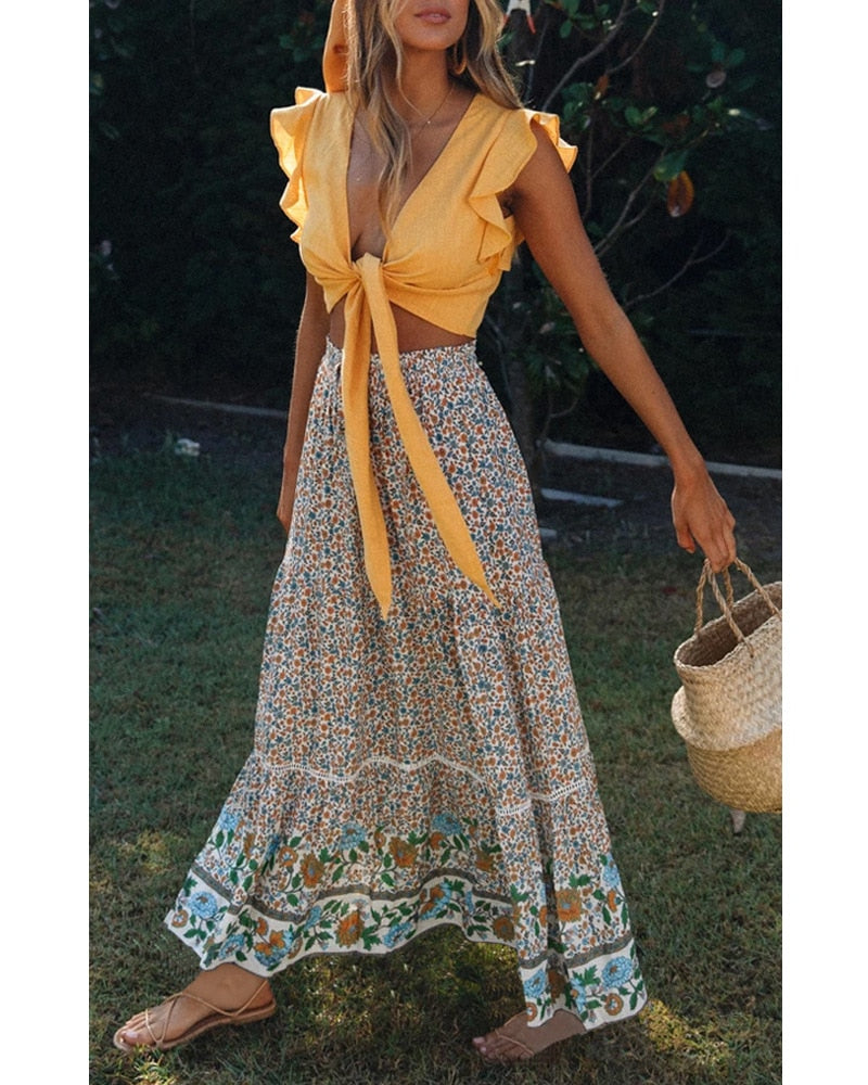 Maxinederdel med blomsterprint og udsvunget boho-snit