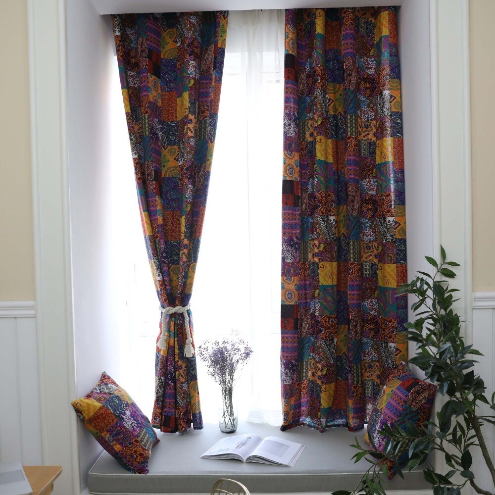 Patchwork curtain panel with paisley motifs in warm hues