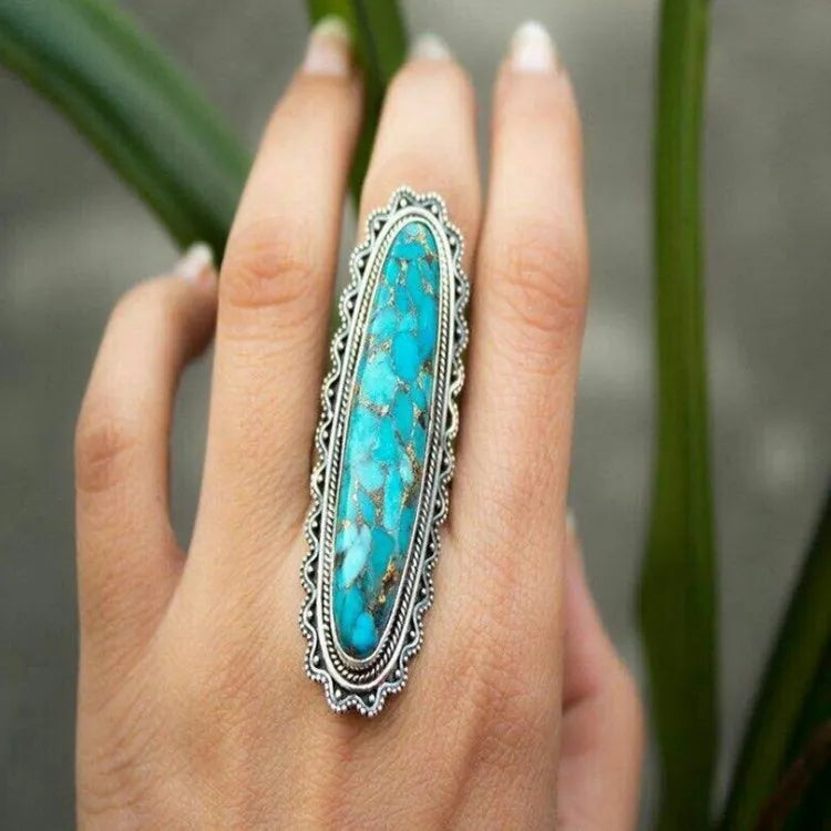 Chunky silver-toned hippie ring set with a turquoise stone