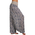 Model wearing gray loose harem pants with low drop-crotch