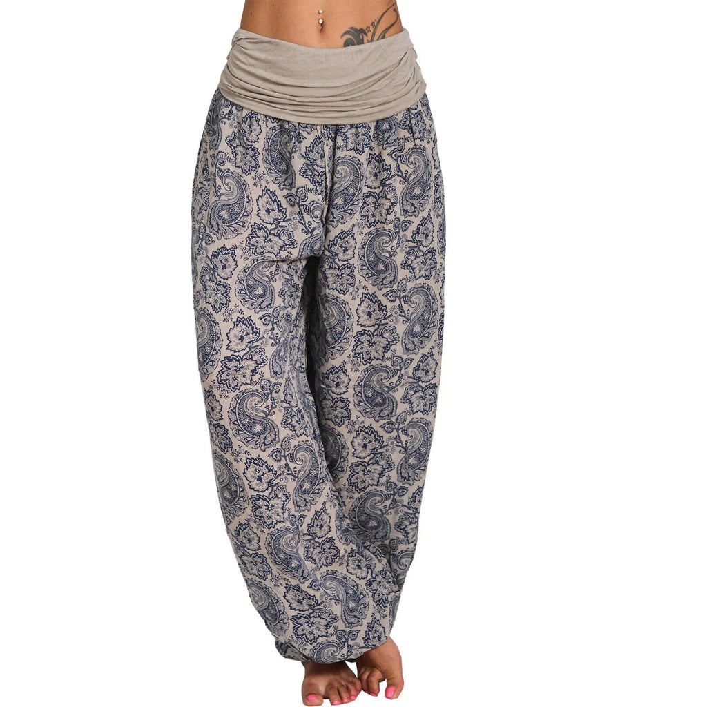 Gray plus size harem pants with loose drop-crotch cut on light background