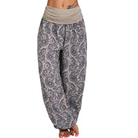 Gray plus size harem pants with loose drop-crotch cut on light background