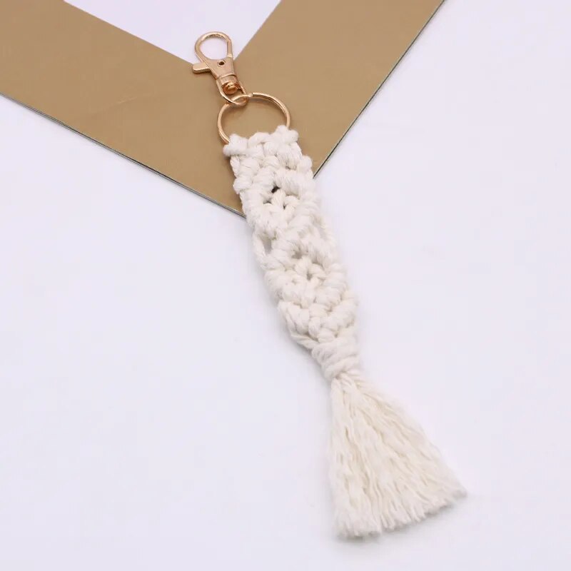 Handmade feather keychain to clip onto a bag