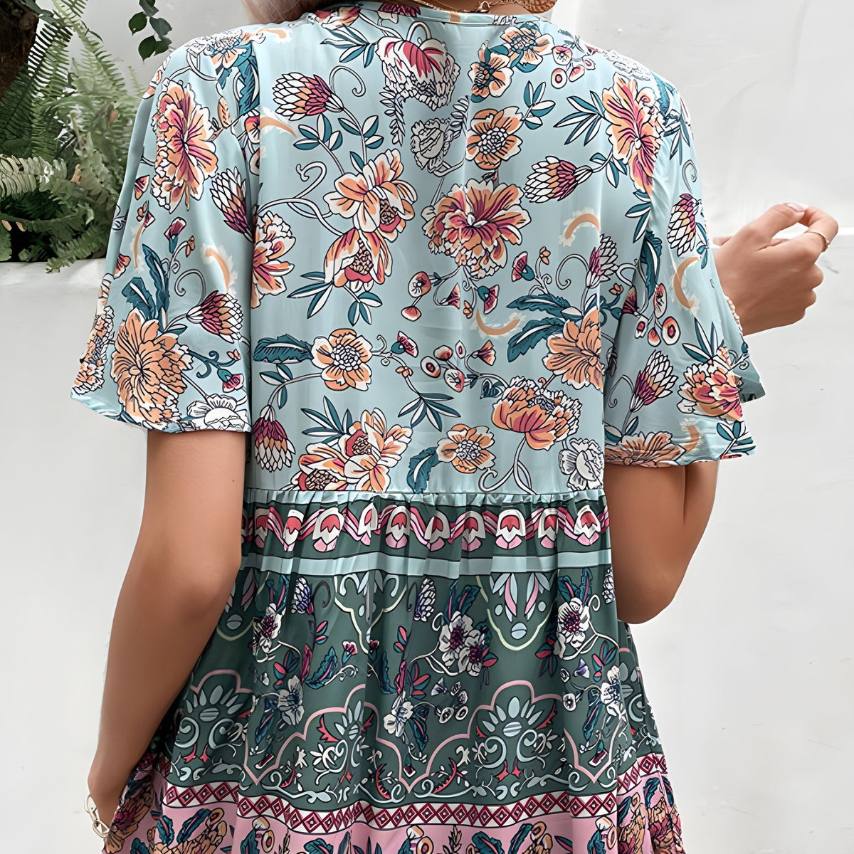 Back view of boho blouse and its bordered ruffle