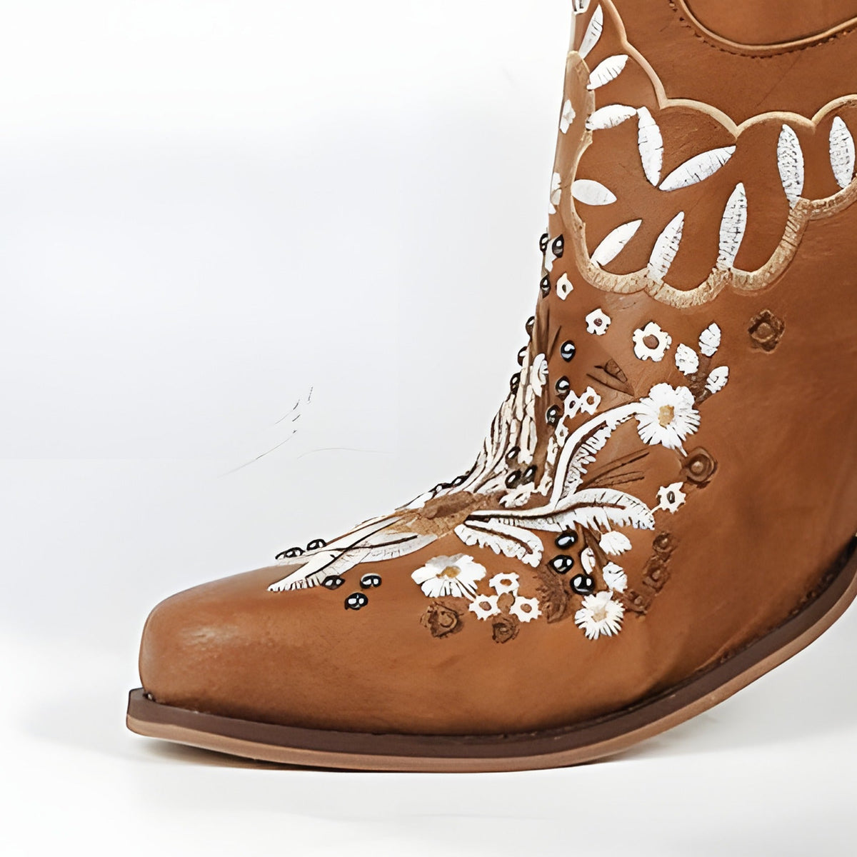 Detail of the pointed toe and floral embroidery on the boot