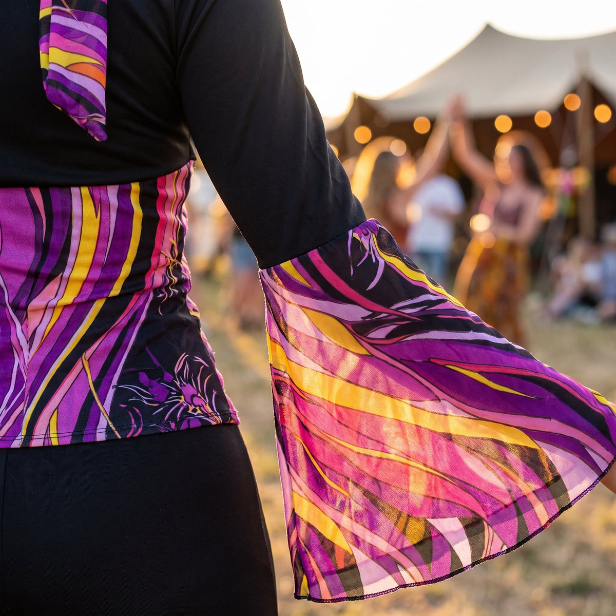 Close-up of the purple pink and yellow psychedelic print
