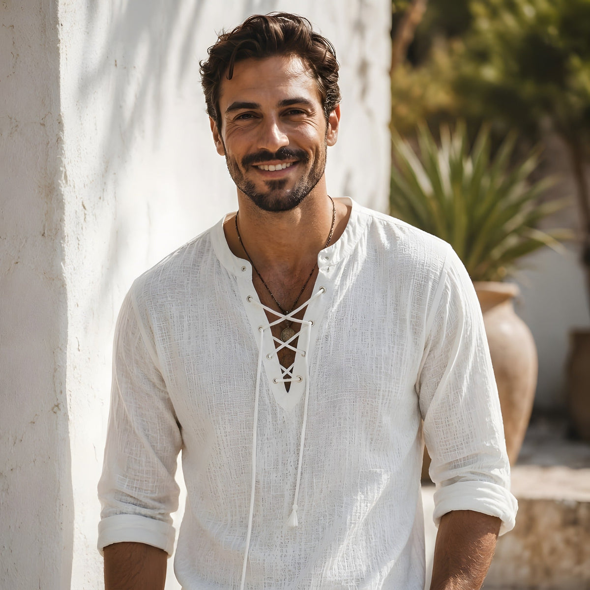 White men's hippie shirt with lace-up collar worn by smiling model