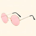 Round gold frame sunglasses with pink tinted lenses