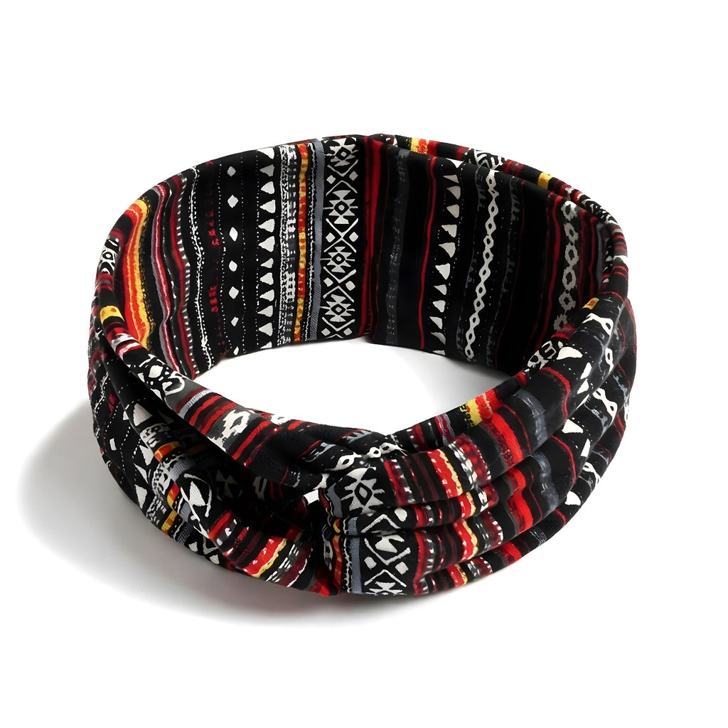 Schwarzes Stirnband mit geometrischem Print und Kreuzknoten auf weißem Hintergrund