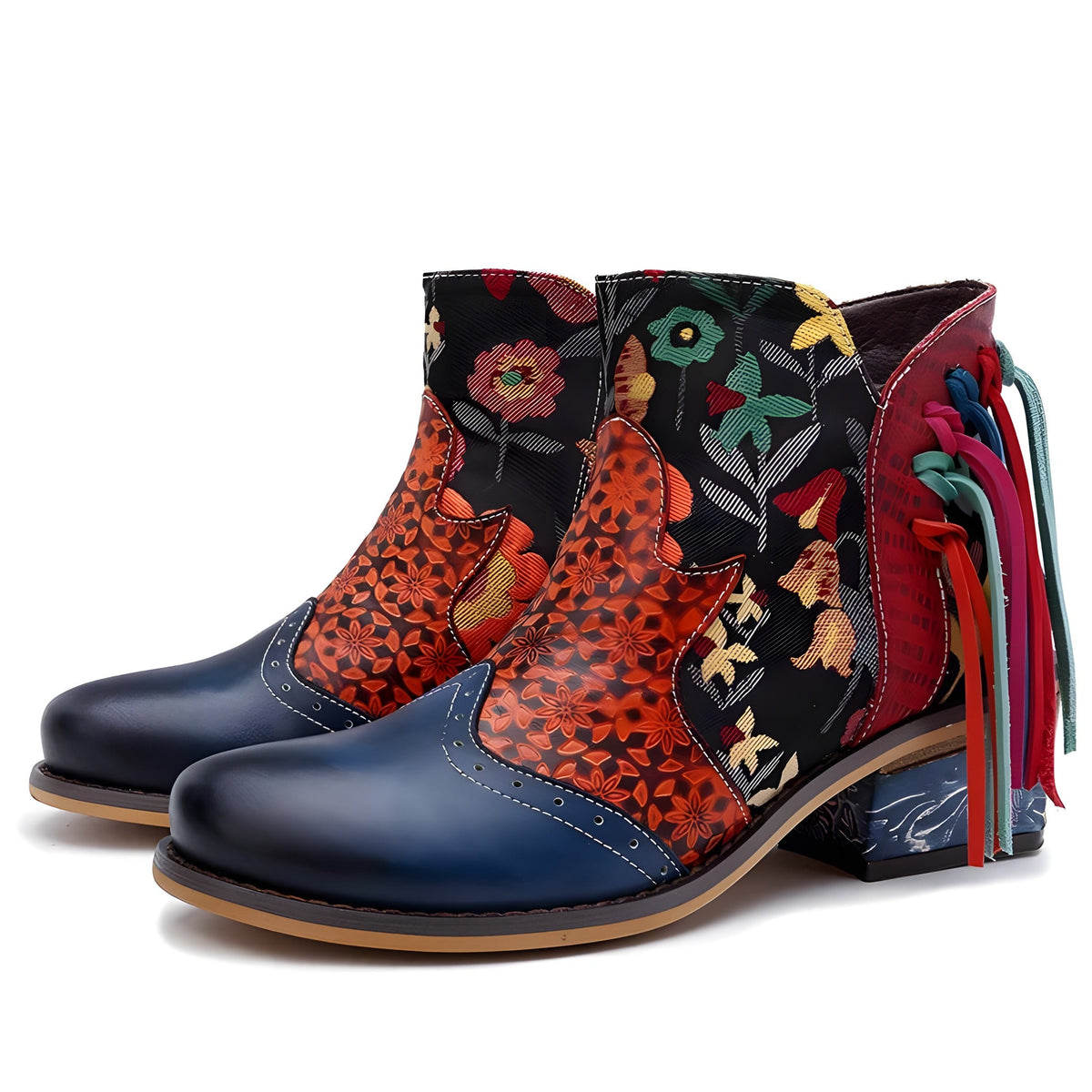 Pair of leather boho boots front view, floral panels and fringe