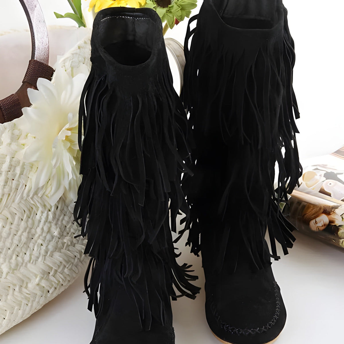 Black suede fringe boots in boho moccasin style
