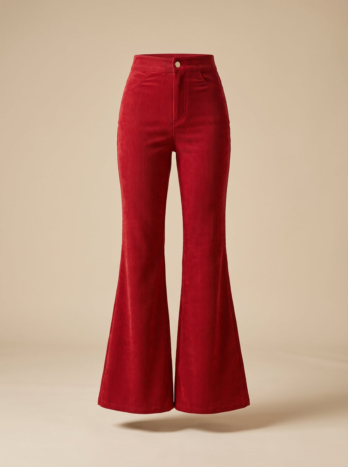 Red flared pants on a ghost mannequin in studio