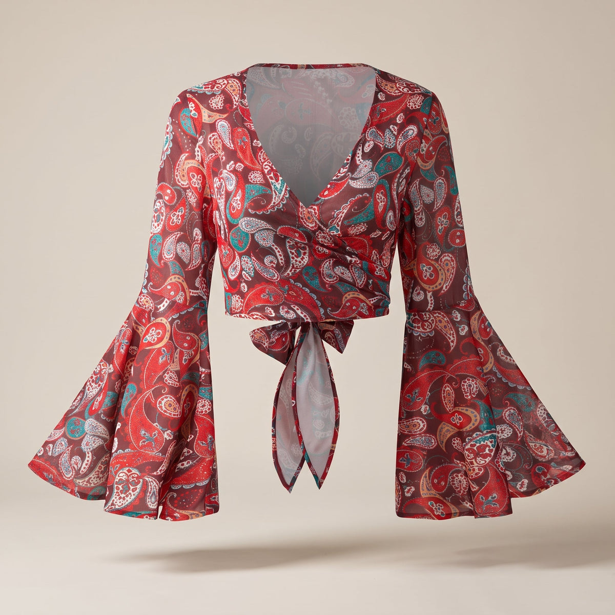 Red paisley wrap crop top, front view on cream background