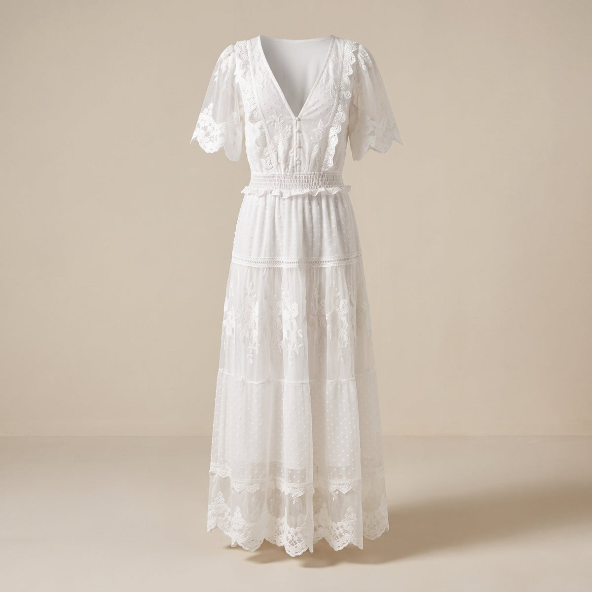 White boho maxi dress shown on a ghost mannequin