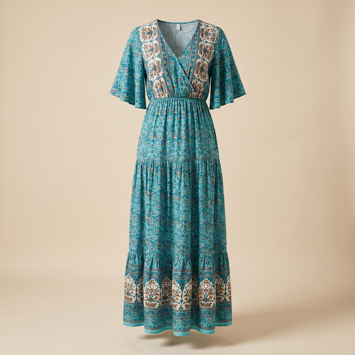 Turquoise floral maxi dress shown on an invisible mannequin