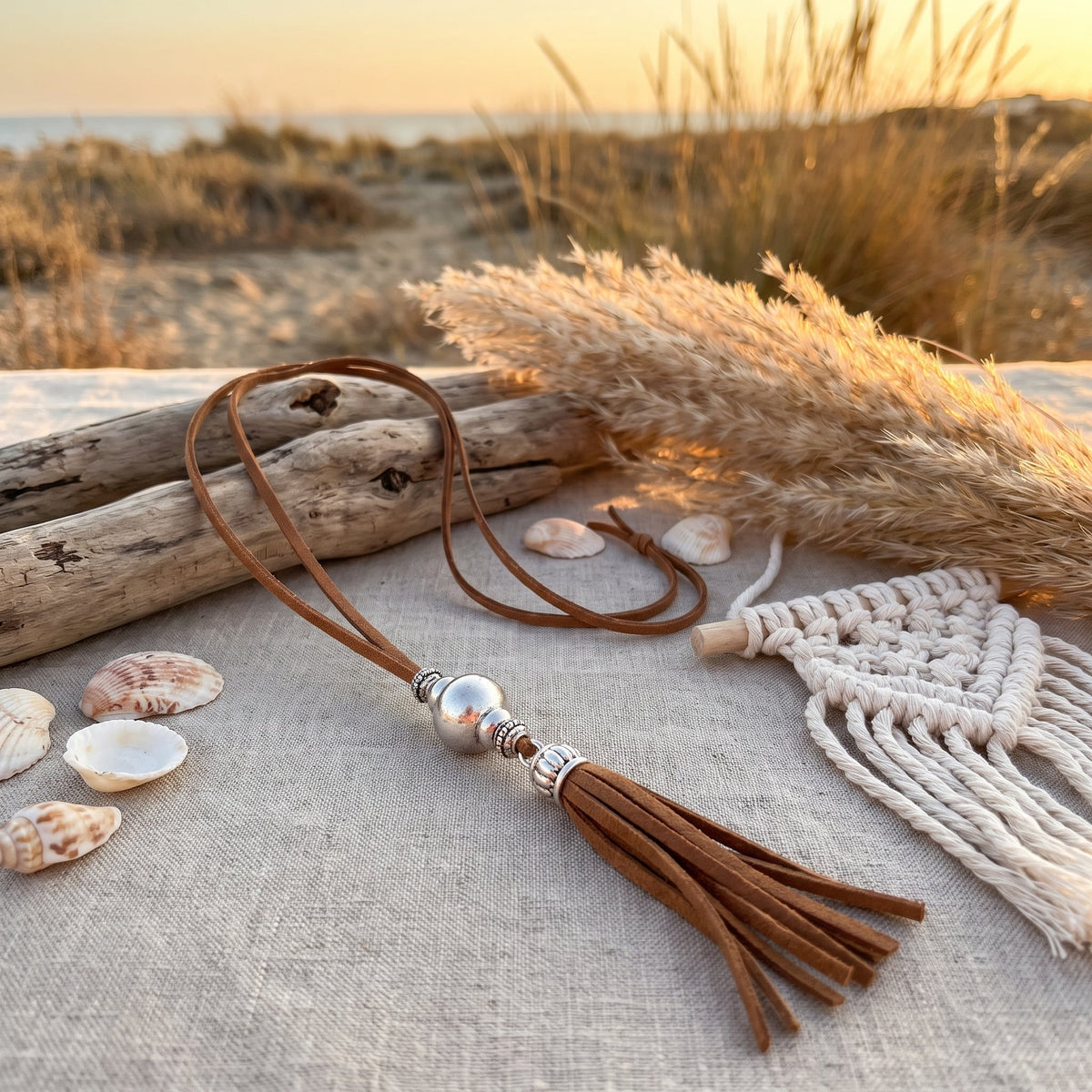 Leather and steel boho necklace styled in a lifestyle setting