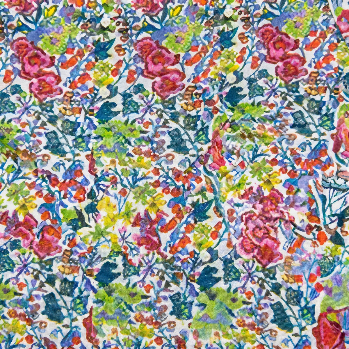 Close-up of the multicolor millefleurs print on a light background