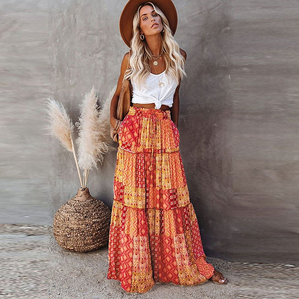 Oranje rok met patchworkprint en volants in lagen, volledige lengte