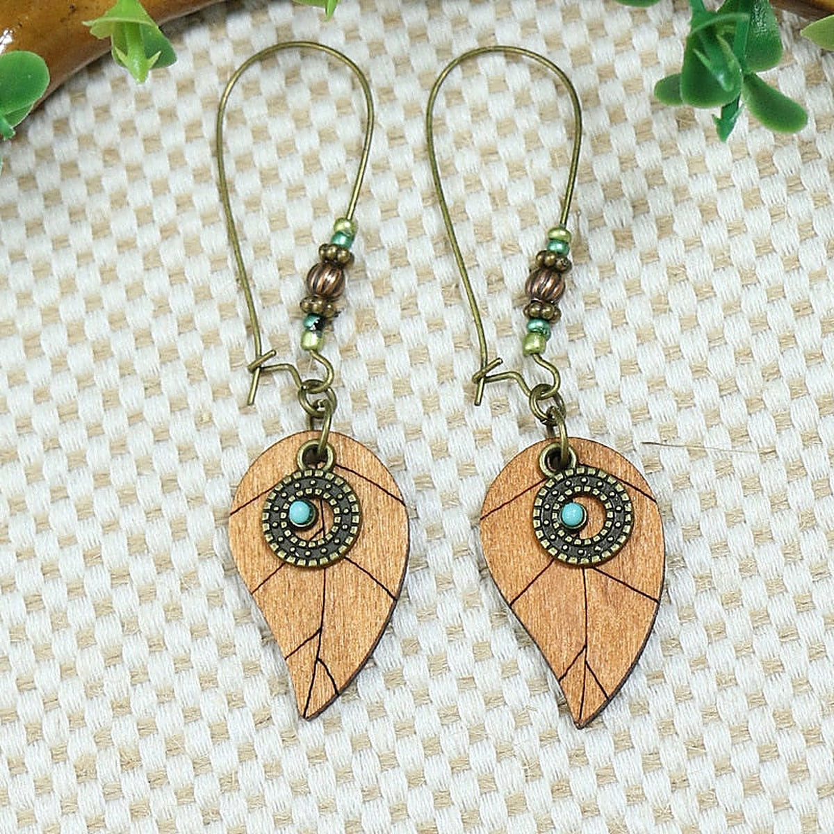 Wooden leaf hippie earrings with a turquoise bead