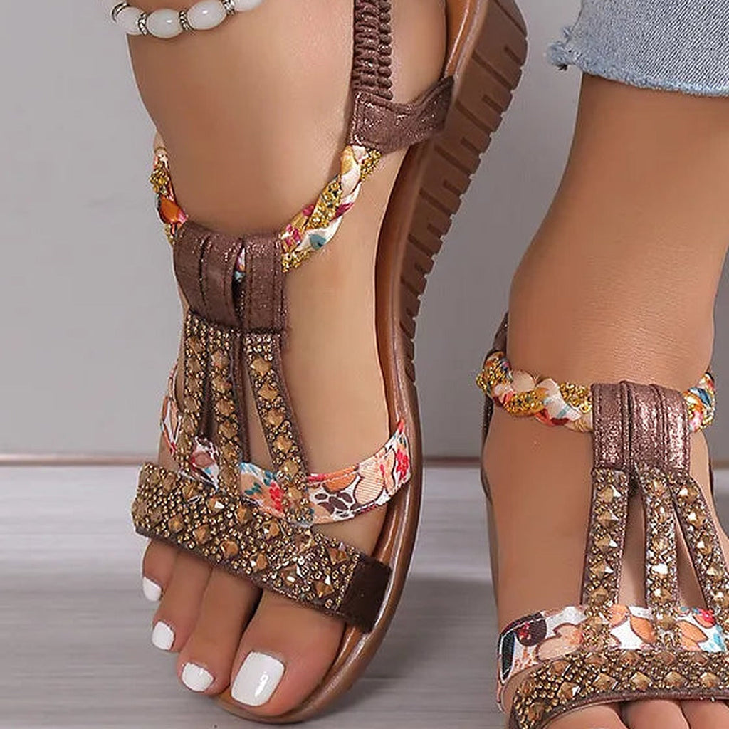 Close-up of the gold rhinestones and floral strap