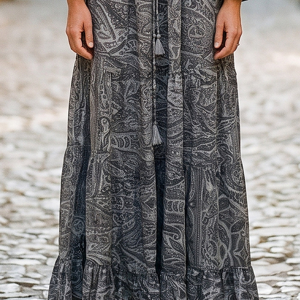 Close-up of the gray paisley printed fabric