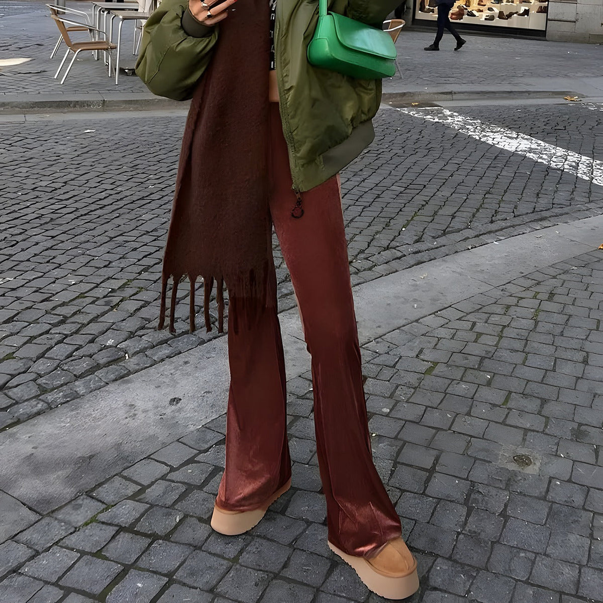 Three-quarter view of high-waisted retro flared trousers