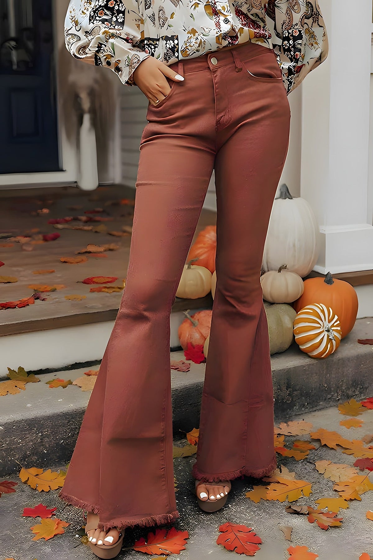 Brown flared denim jeans with high waist and wide hem