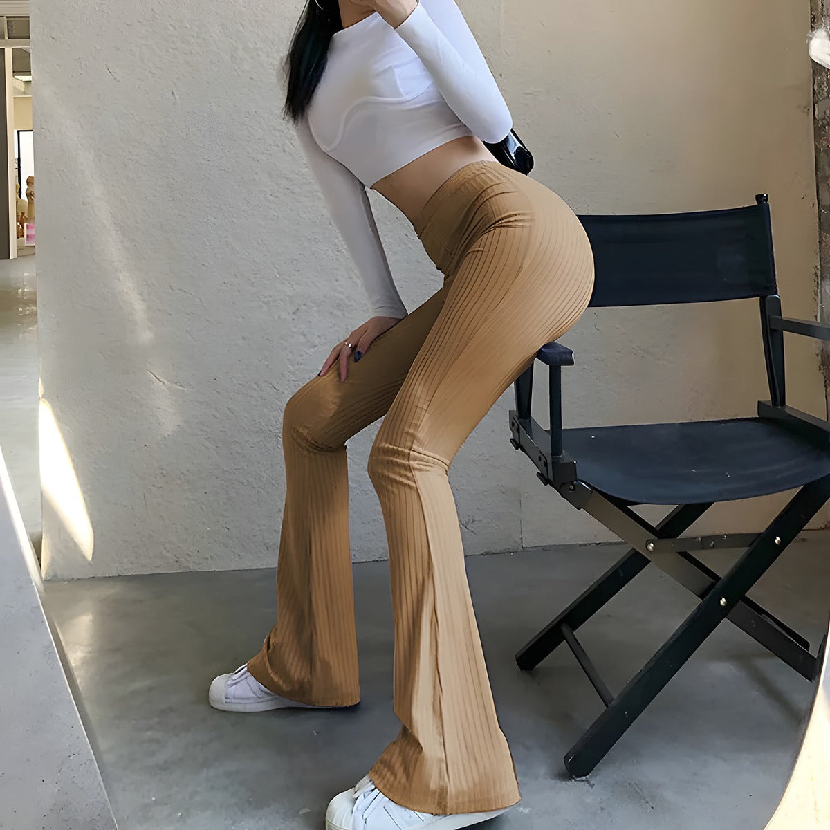 Front view of the neutral beige boho flared pants