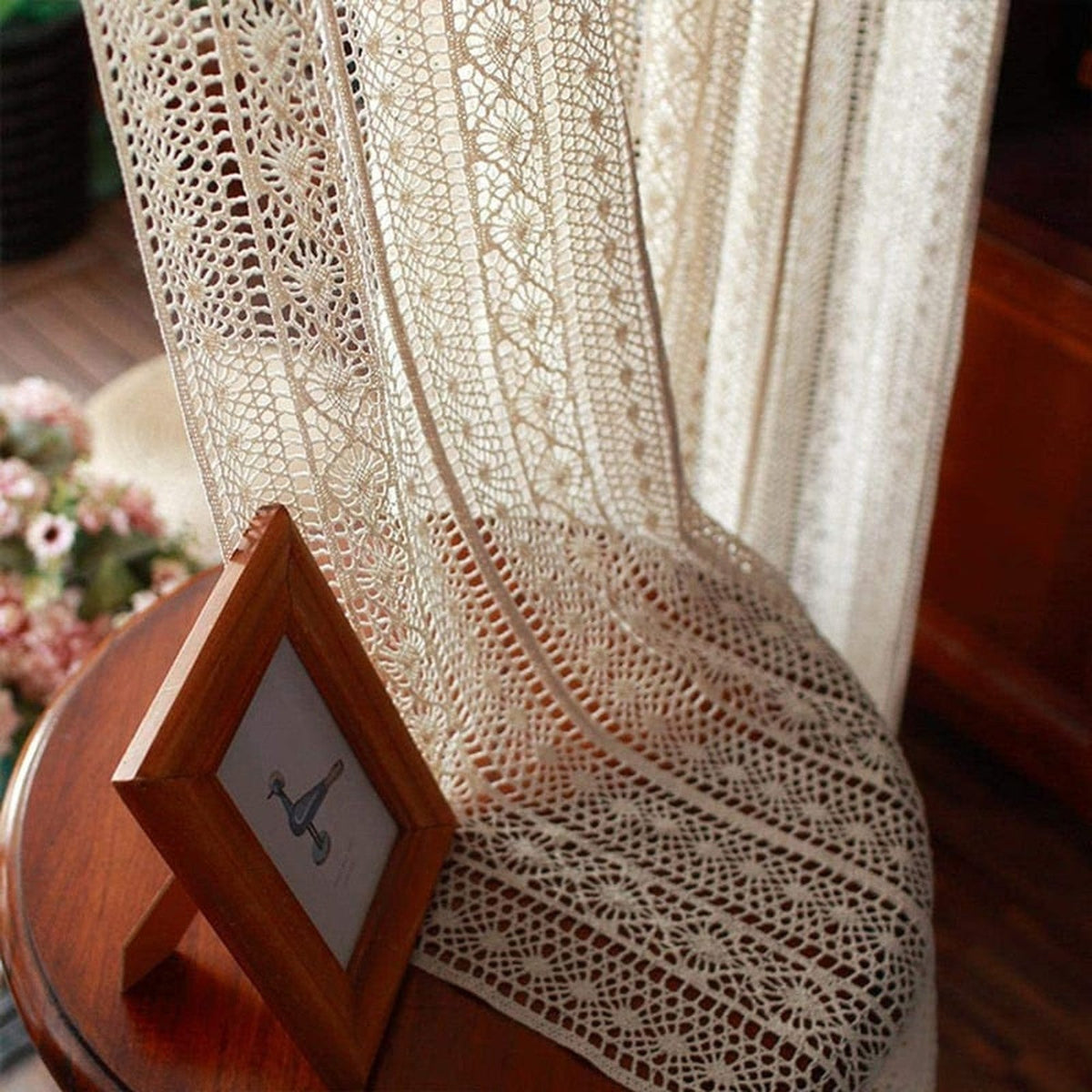 Knotted fringe finish along the bottom of the curtain