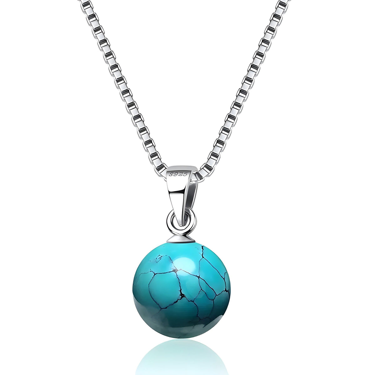 Turquoise stone pendant on a delicate silver chain
